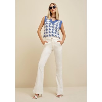 WHITE FLARE PANTS BY MORENA ROSA.